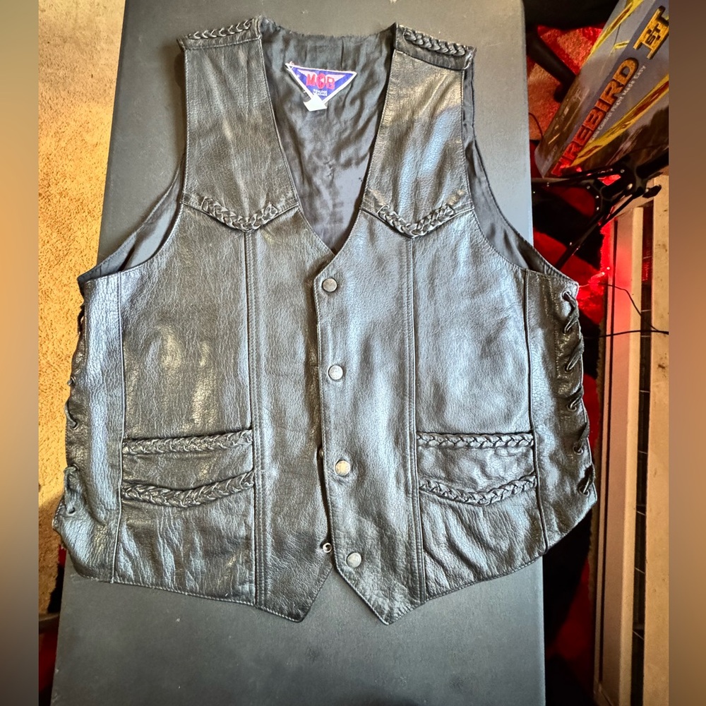 Men's Black Leather Vest with Braided Details great condition. Make me an offer